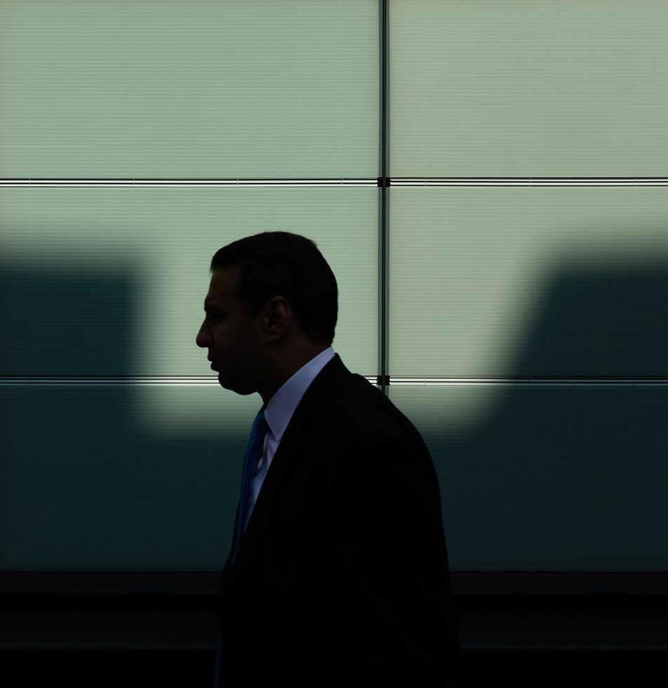 Side profile of a man in a suit 