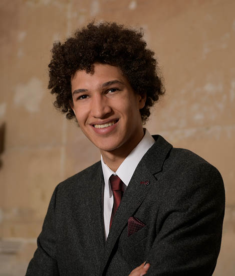 Man smiling whilst posing