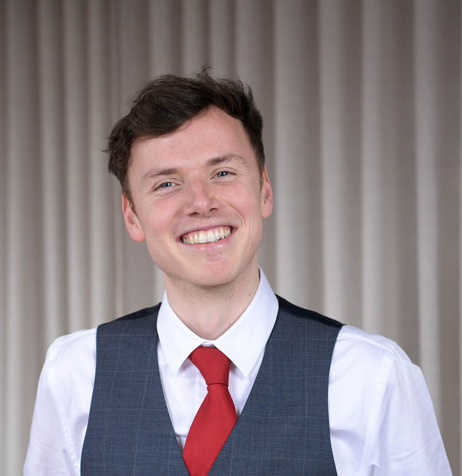 Man in a tie smiling