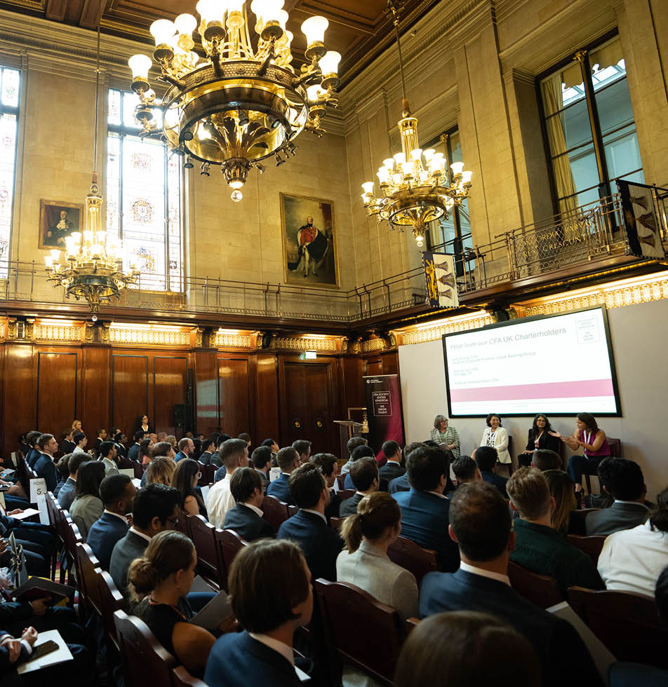 Crowd of people listening in a conference