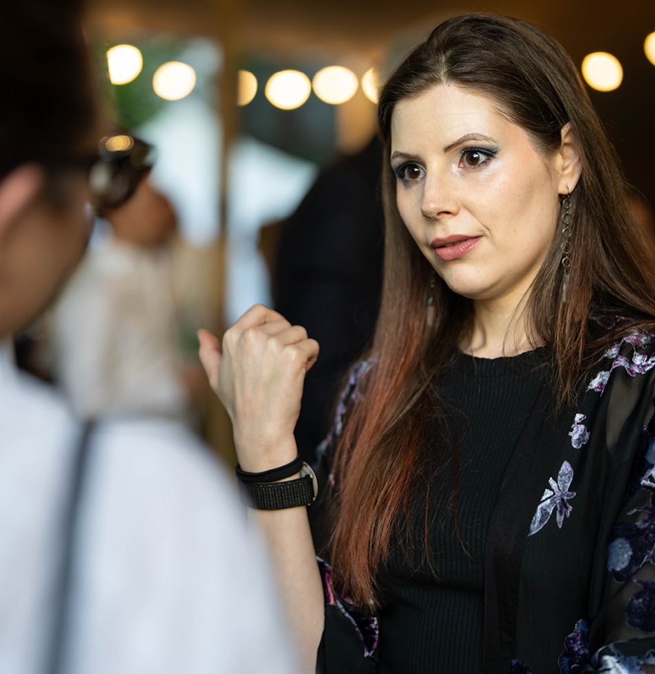 Woman talking at a networking event