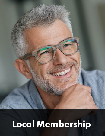 Man wearing glasses smiling