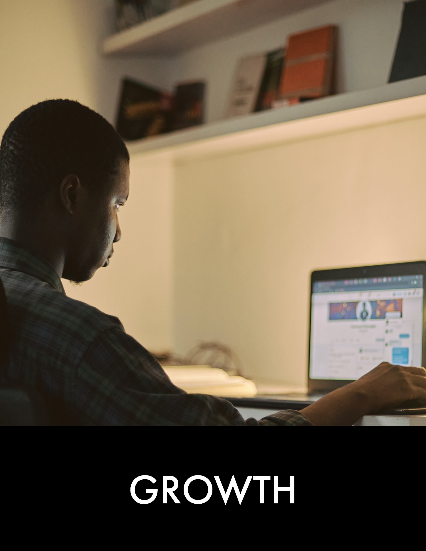 Man sitting on laptop in home office