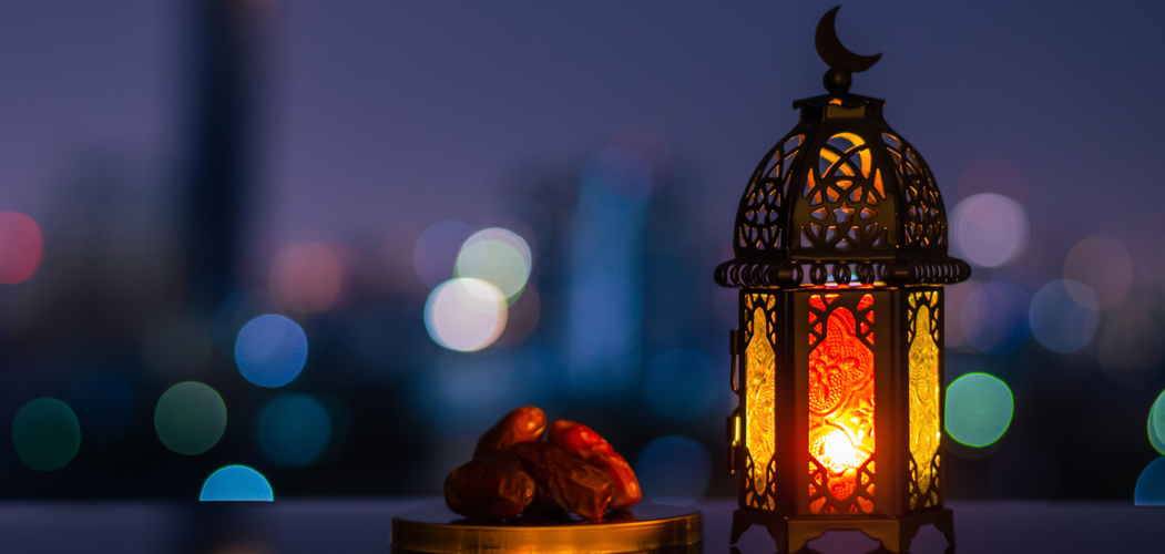 A picture of a lantern and the moon 